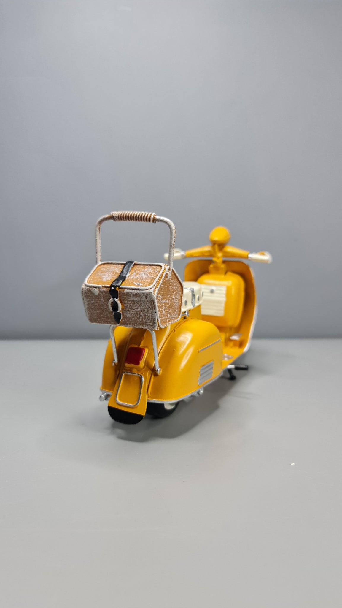 Yellow retro scooter, vintage, collectible, retro miniature, tin and
